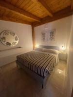 Łóżko lub łóżka w pokoju w obiekcie -DIMARTINO HOME- Posizione centrale 9 min da Marzamemi San Lorenzo Portopalo di Capo Passero