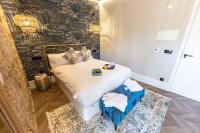 Posteľ alebo postele v izbe v ubytovaní Hospedium Hotel Barómetro de Camariñas