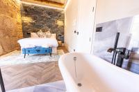 Posteľ alebo postele v izbe v ubytovaní Hospedium Hotel Barómetro de Camariñas
