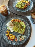 zwei Teller Essen auf einem Tisch in der Unterkunft Seaside vip Hotel in Batumi