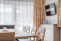 A kitchen or kitchenette at Ferienhaus Apart Sonnzeit