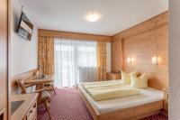 A bed or beds in a room at Ferienhaus Apart Sonnzeit