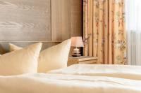 A bed or beds in a room at Ferienhaus Apart Sonnzeit