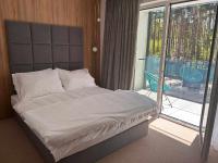 Posteľ alebo postele v izbe v ubytovaní Resort EDEN domki, apartamenty i pokoje