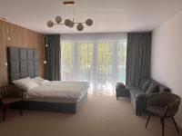 Posteľ alebo postele v izbe v ubytovaní Resort EDEN domki, apartamenty i pokoje