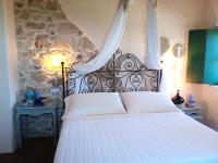 A bed or beds in a room at Villa in Campagna con Piscina Privata