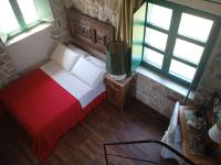 A bed or beds in a room at Villa in Campagna con Piscina Privata