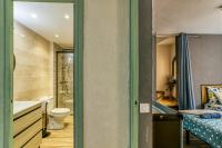 Kúpeľňa v ubytovaní La petite venise Empuriabrava Solarium Vue Mer, 2 Terrasses Clim Parking free Oc keys