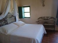 A bed or beds in a room at Villa in Campagna con Piscina Privata