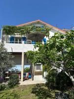 a house with an umbrella on top of it at FLC-Sea View-Jacuzzi-3 Bedrooms-8p-Parking for 2 cars in Marseille