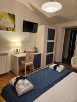 Posteľ alebo postele v izbe v ubytovaní Albis Rooms Guest House