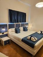 Posteľ alebo postele v izbe v ubytovaní Albis Rooms Guest House