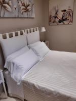 A bed or beds in a room at Hotel Tirreno