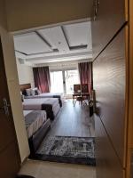 swiss hotel downtownにあるベッド