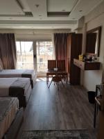 swiss hotel downtownにあるベッド