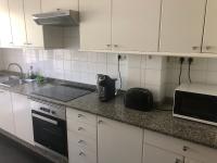 Kuchyň nebo kuchyňský kout v ubytování Alojamiento ideal en Santiago