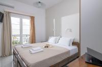 Posteľ alebo postele v izbe v ubytovaní Litsa Mare Apartments