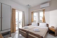 Posteľ alebo postele v izbe v ubytovaní Litsa Mare Apartments