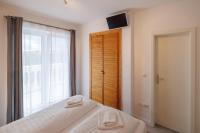 Posteľ alebo postele v izbe v ubytovaní Guesthouse Halilagic