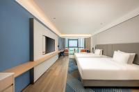 Holiday Inn Express Nanjing Riverside by IHGにあるベッド