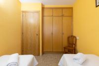 Postel nebo postele na pokoji v ubytování PARADIS 2 Planet Costa Dorada
