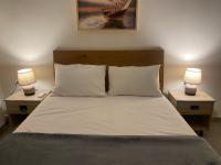 A bed or beds in a room at lividio apartment
