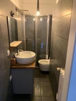 Łazienka w obiekcie Bel appartement avec emplacement idéal