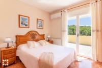 Postel nebo postele na pokoji v ubytování Villa Gema by Abahana Villas