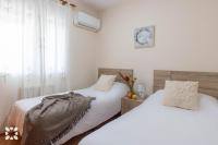 Postel nebo postele na pokoji v ubytování Villa Gema by Abahana Villas