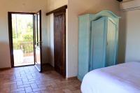 Posteľ alebo postele v izbe v ubytovaní Agriturismo Suite del Conte