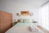 Postel nebo postele na pokoji v ubytování CHIC APARTAMENTS