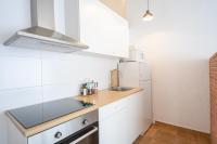 Kuchyň nebo kuchyňský kout v ubytování CHIC APARTAMENTS