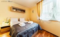 Posteľ alebo postele v izbe v ubytovaní Wonder Home - Apartamenty w malowniczej okolicy, z balkonami i widokiem na góry