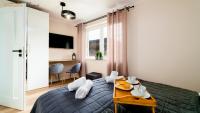Posteľ alebo postele v izbe v ubytovaní Wonder Home - Apartamenty w malowniczej okolicy, z balkonami i widokiem na góry