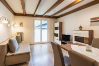 A television and/or entertainment centre at Appartementanlage Thermenblick SKI IN & SKI OUT