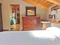 A bed or beds in a room at El Arcon