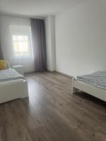 Postel nebo postele na pokoji v ubytování ALEX-Ferienhaus