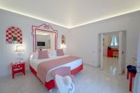Villa Francesco Luxury Suitesにあるベッド