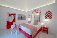 Villa Francesco Luxury Suitesにあるベッド