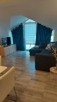 Televízia a/alebo spoločenská miestnosť v ubytovaní Apartment Modrić Zadar
