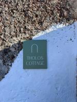 Certifikát, ocenenie alebo iný dokument vystavený v ubytovaní Tholos Cottage