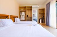 Postel nebo postele na pokoji v ubytování Rakmak Kan Resort & Cafe