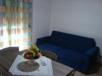 A seating area at Le Tre Rose di Maria