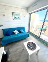 Ruang duduk di Carnon Appartement Duplex paisible Vue mer et acc&egrave;s plage !