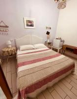 A bed or beds in a room at B&B Rifugio Angelina