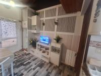 TV a/nebo společenská místnost v ubytování La Casita
