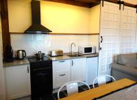 Kuchyňa alebo kuchynka v ubytovaní Apartamentos Minas de Silvarosa