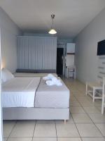 Posteľ alebo postele v izbe v ubytovaní Captain Nick Aparthotel