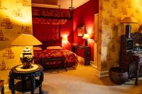 Schloss Auel Boutique Hotel & Design Golf Lodgeにあるベッド