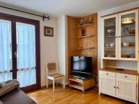 A television and/or entertainment centre at BPIRINEOS-Las Plazas